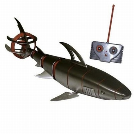 Full-function, radio-controlled shark moves forward, backward, left, right, up and down.